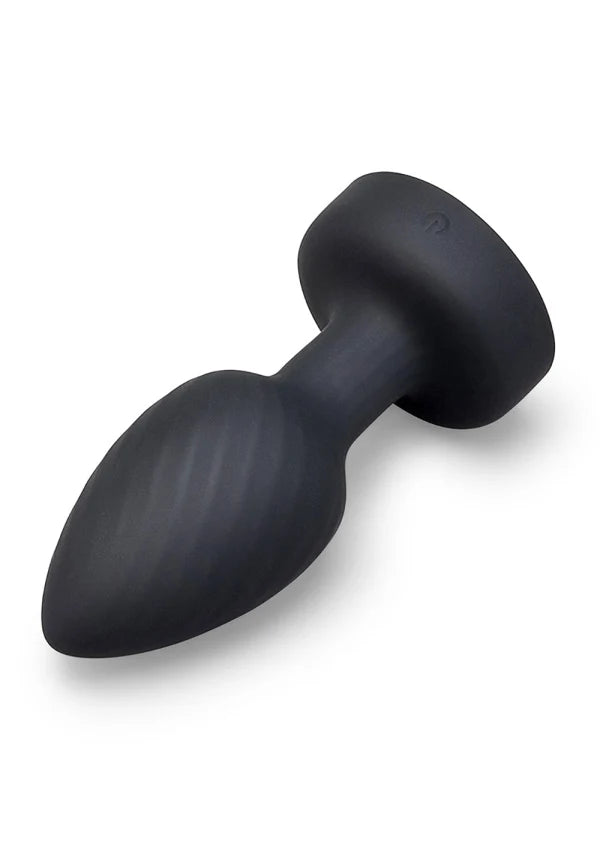 A matte black silicone butt plug with a flared base and ribbed shaft, shown on a clean white background.
