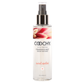 COOCHY fragrance mist bottle with floral design on a white background